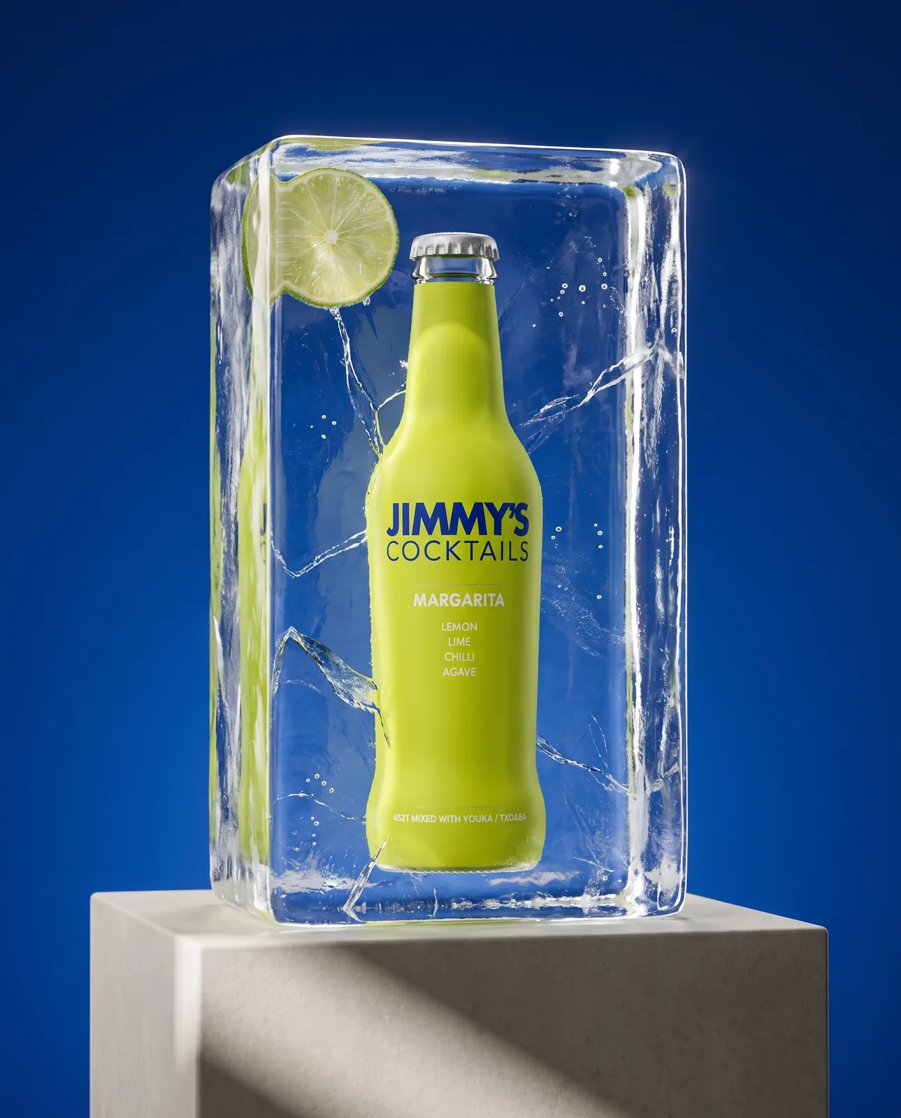 Jimmy's Cocktails bottle frozen inside a block of ice